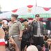 HADIR: Kapolres Malang AKBP Kholis ikut berbaur bersama ribuan pemuda Ansor dan Banser. (SuaraGong/ist)