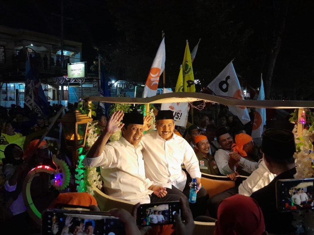 FT : Abah Gun dan Dr Umar Naik Delman Menuju KPU Ka Malang