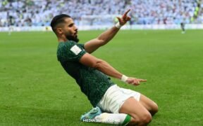 Saleh Al-Shehri pemain arab saudi melakukan selebrasi setelah mencetak gol dari haiti 0-1