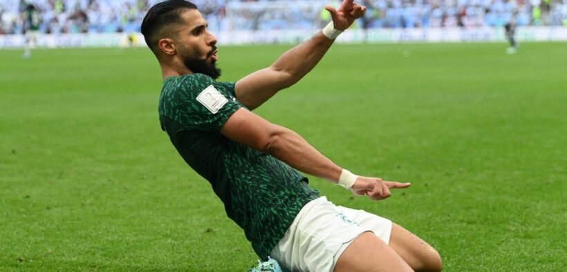 Saleh Al-Shehri pemain arab saudi melakukan selebrasi setelah mencetak gol dari haiti 0-1