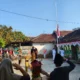 Ratusan warga Mangunrejo, Kepanjen laksanakan upacara HUT Ke-80 RI dengan penuh semangat sambil mengenakan pakaian adat dan Kostum