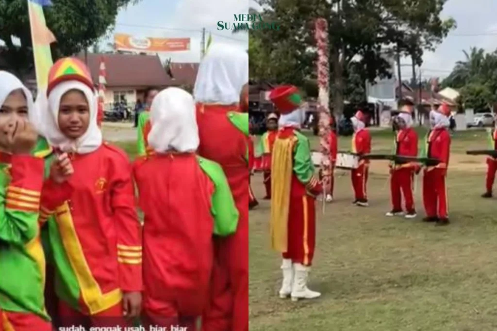 Drum Band Siswa MTsN 7 Sungai Bahar Gagal tampil akibat panitia memilih memutar lagu ulang tahun untuk camat setempat. 