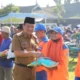 Pemerintah Kabupaten Jombang melalui Dinas Sosial Kabupaten Jombang menyalurkan bantuan sosial untuk ribuan warga